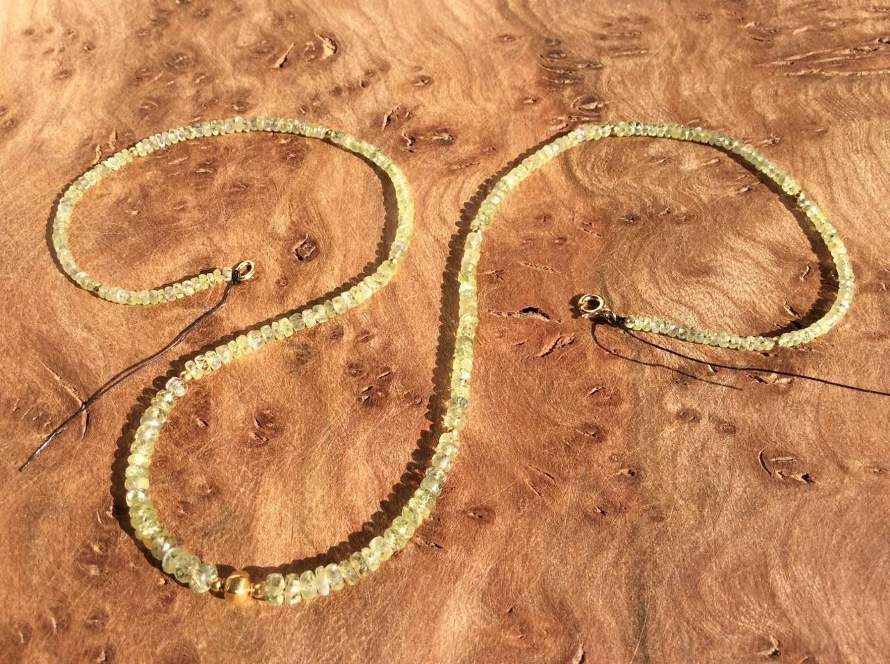 Chrysoberyll mit einem indischen Goldbead